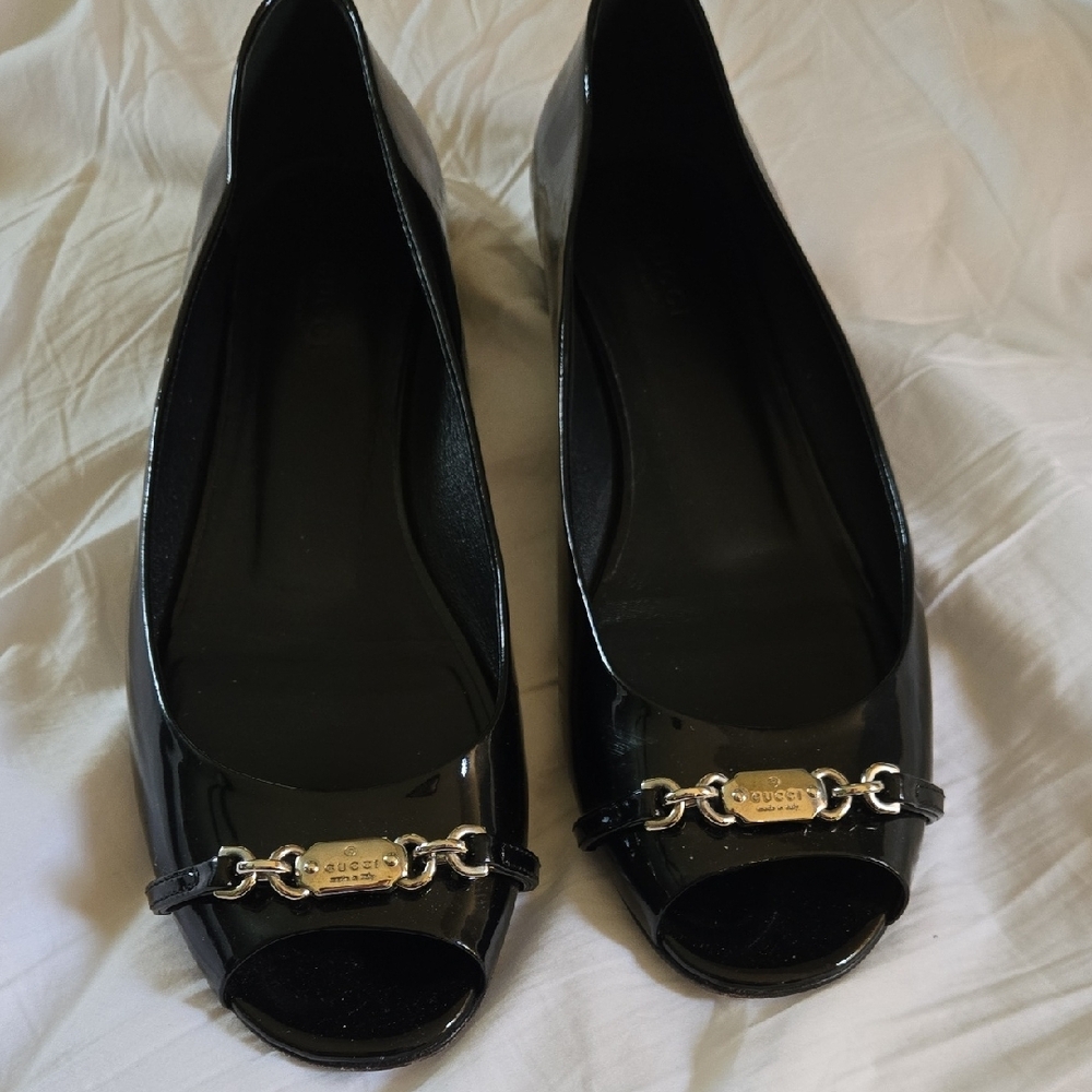 Gucci Black Flats with Gold Hardware
